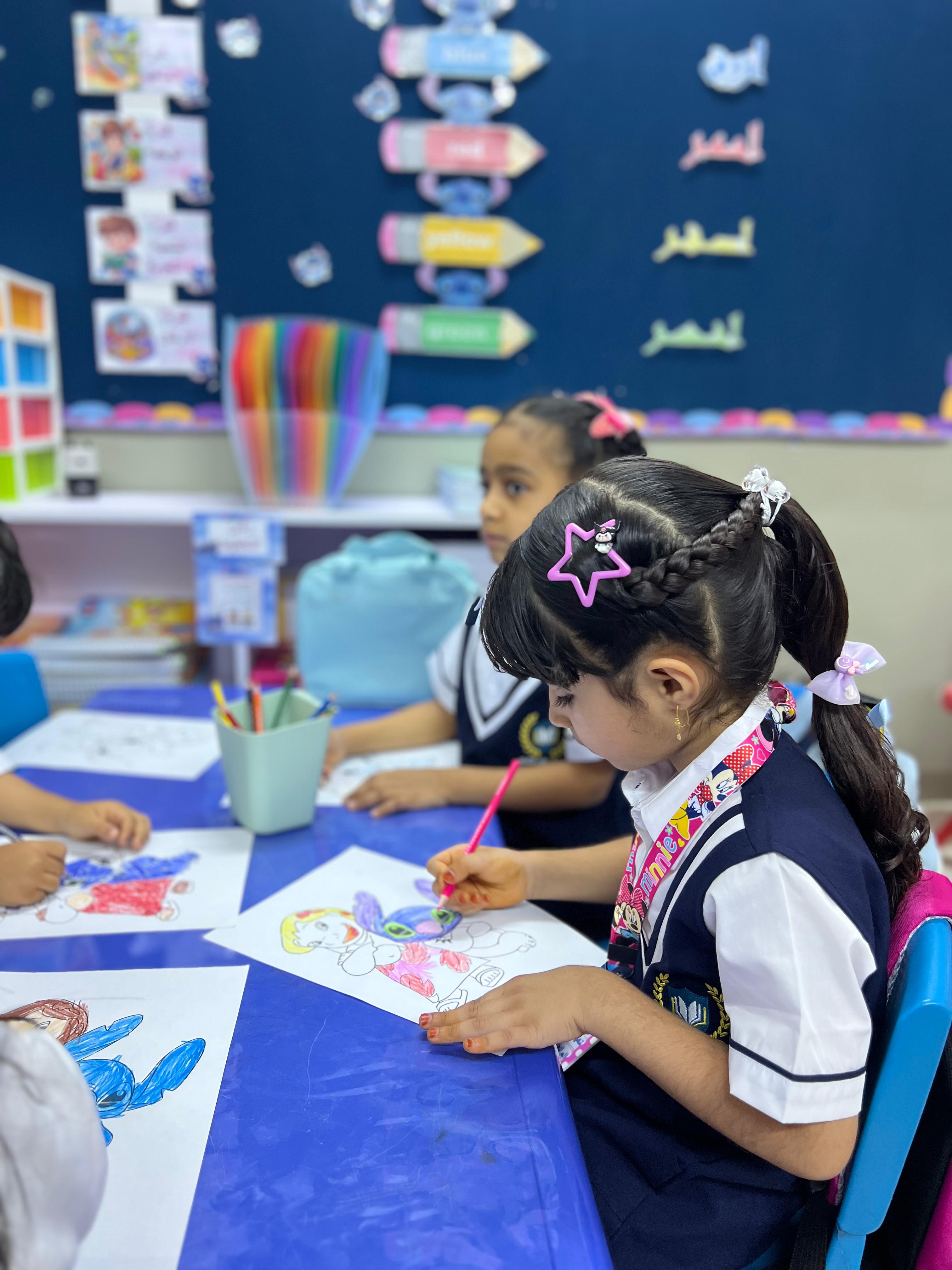 Teacher with kindergarten children in a colorful classroom